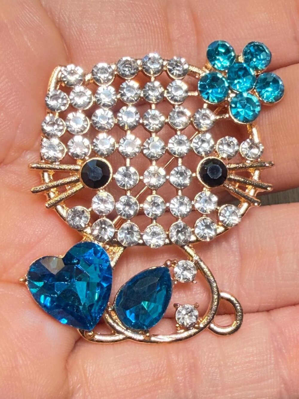 Hello Kitty Style Brooch with Blue Rhinestone Flower Accent 2.25"